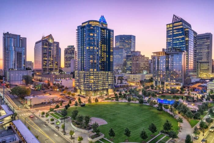 Charlotte, North Carolina, USA uptown skyline and park.