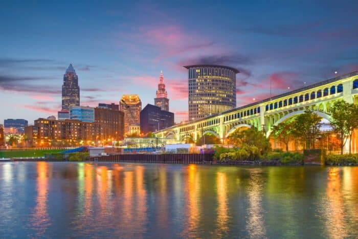 Cleveland, Ohio, USA downtown city skyline on the Cuyahoga River at twilight.